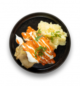 Cabbage rolls with meat filling and bell pepper sauce