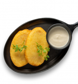 Samogitian pancakes with mushroom sauce