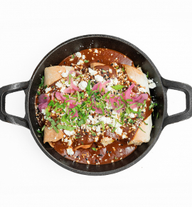 Enchilada with chicken and corn in Mole sauce