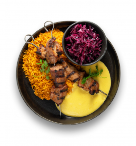 Grilled pork skewers with corn sauce