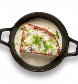 Tortilla lasagna with chicken and champignon sauce